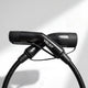 Studio shot of the black carbon fibre Voldt Type 2 EV charging cable and its connectors